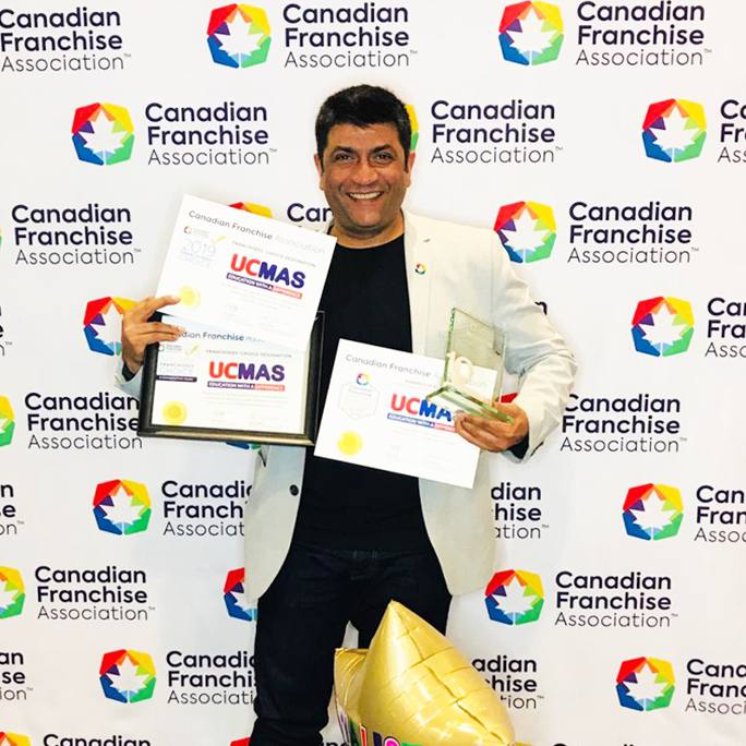 Anand Karia with Canadian Franchise Association Certifications.